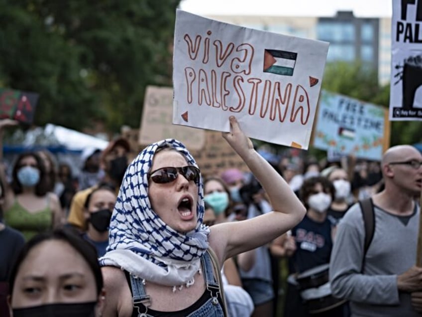 WASHINGTON DC, UNITED STATES - MAY 07: Students chant slogans as they continue pro-Palesti