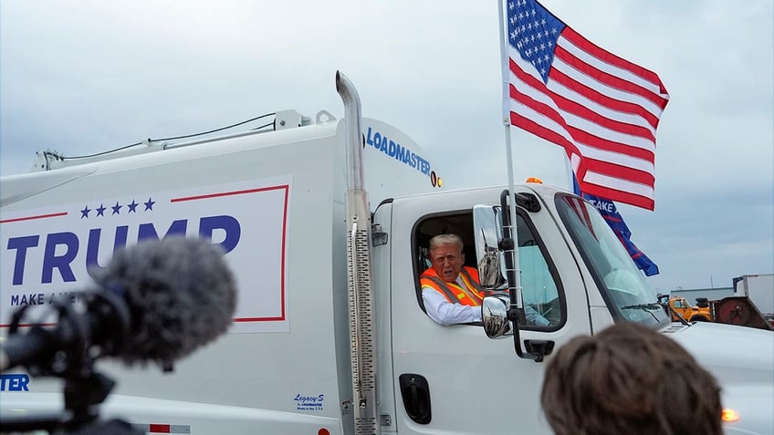 Trump in a garbage truck