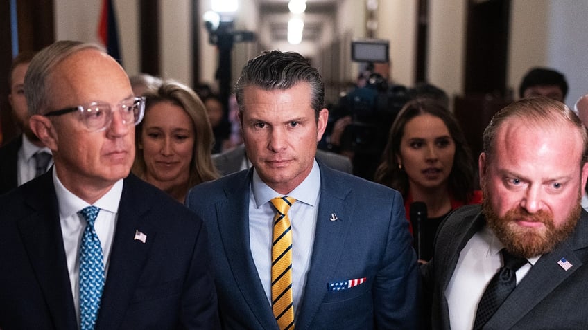 Pete Hegseth, President-elect Donald Trump's nominee to be defense secretary, makes his way to a meeting with Sen. Ted Budd, R-N.C., in the Russell Senate office building on Tuesday, December 3, 2024. (Tom Williams/CQ-Roll Call, Inc via Getty Images)