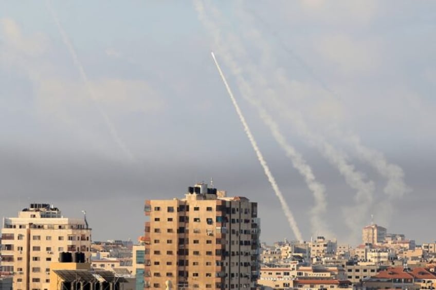 dozens of rockets fired from gaza towards israel