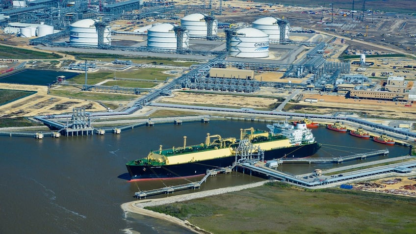 The Asia Vision LNG carrier ship sits docked at the Cheniere Energy Inc. terminal in this aerial photograph taken over Sabine Pass, Texas, U.S., on Wednesday, Feb. 24, 2016. Cheniere said in a statement last month. Cheniere Energy Inc. expects to ship the first cargo of liquefied natural gas on Wednesday to Brazil with another tanker to be loaded a few days later, marking the historic start of U.S. shale exports and sending its shares up the most in more than a month. Photographer: Lindsey Janies/Bloomberg via Getty Images