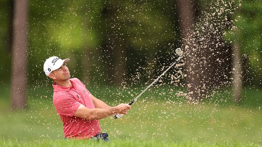 Louis De Jager plays a bunker shot