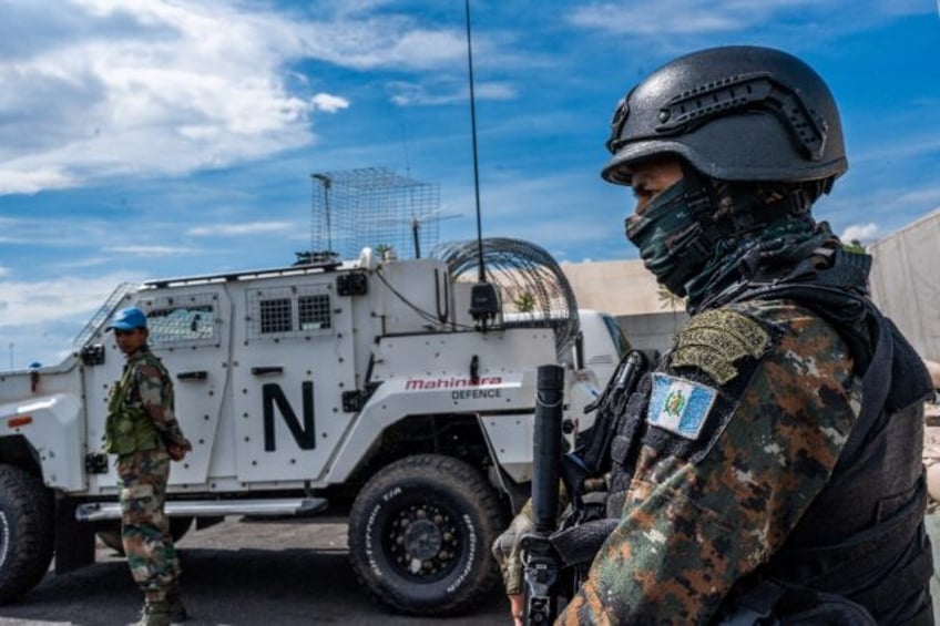 A Monusco peacekeeper looks on at the force's base during a field training exercise in Sake, eastern Democratic Republic of Congo in November 2023