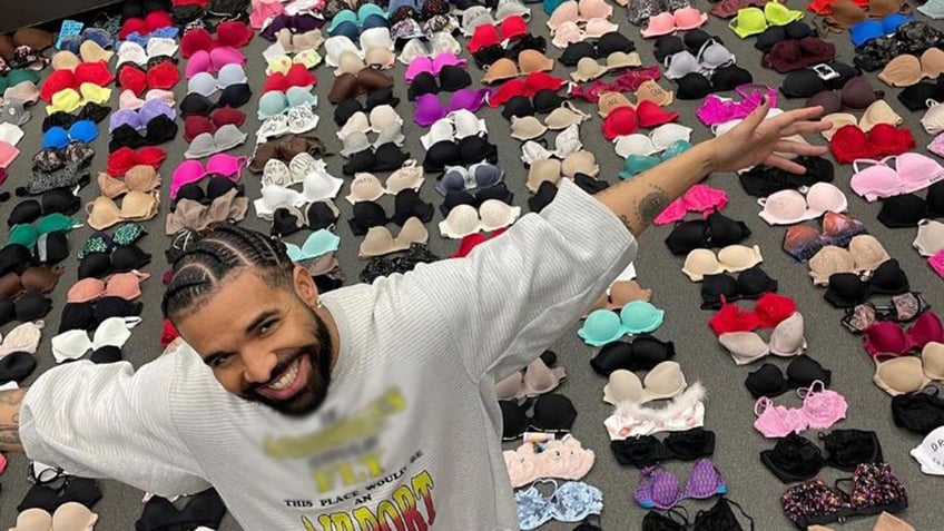 drake flaunts collection of bras thrown on stage during his its all a blur tour