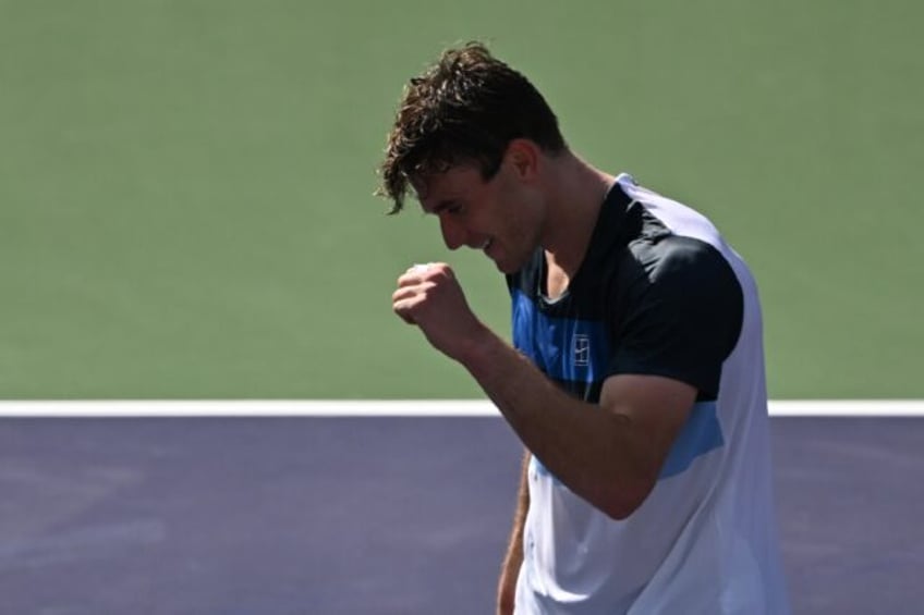 Britain's Jack Draper celebrates his victory over Denmark's Holger Rune in the Indian Well