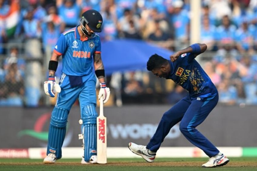 dravid says kohli relaxed amid tendulkar record hype