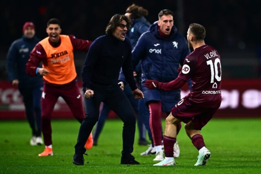 Nikola Vlasic (R) thrashed in Torino's equaliser against Juve