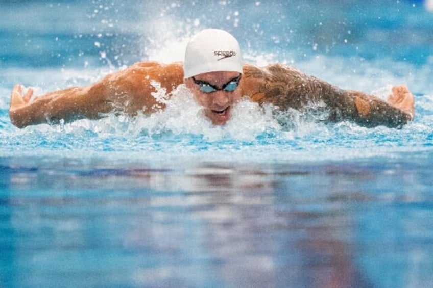 dressel back in winners circle with us open 100m fly triumph