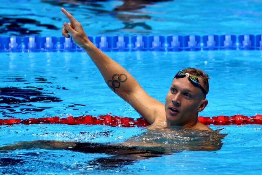 Back on top: Caeleb Dressel celebrates his victory in the 50m freestyle at the US Olympic