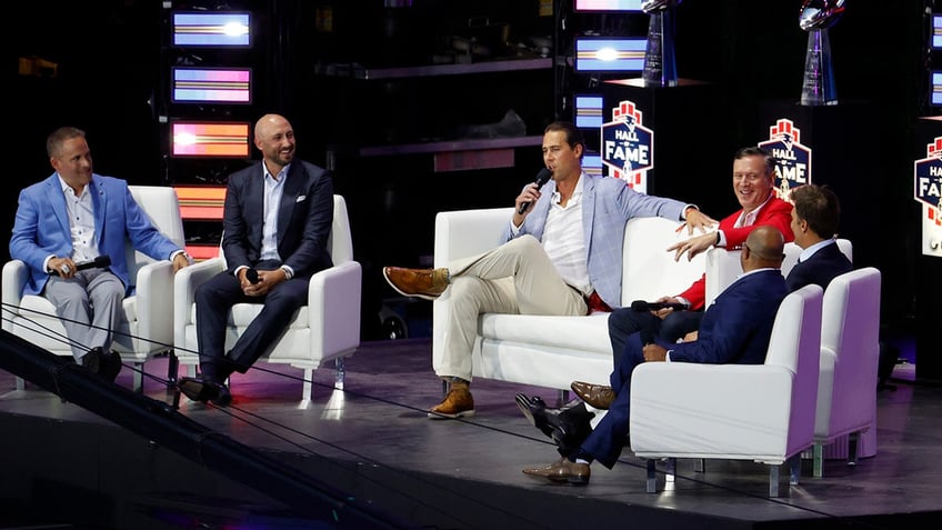 Patriots players on the chairs