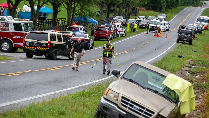 investigators at scene of crash