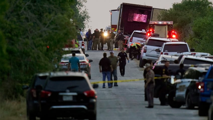 Law enforcement at the scene where officials found illegal immigrants in the back of a tractor trailer.