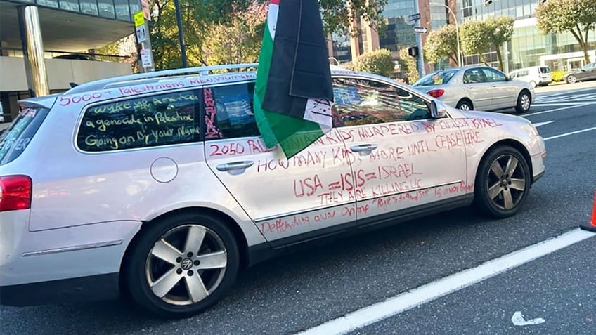 driver of car covered in pro hamas writing illegally had gun blocks from planned pro israel rally police