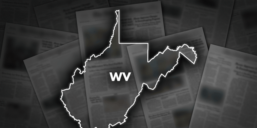 driver rescued in west virginia after car rolls down steep 70 foot river embankment