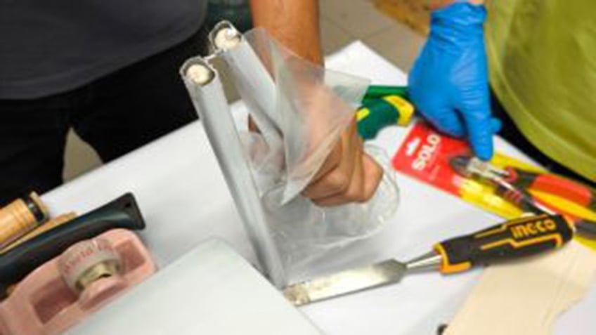 Clothes racks with cocaine hidden in tubing