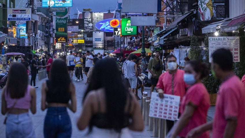 Tourists on street in Bangkok