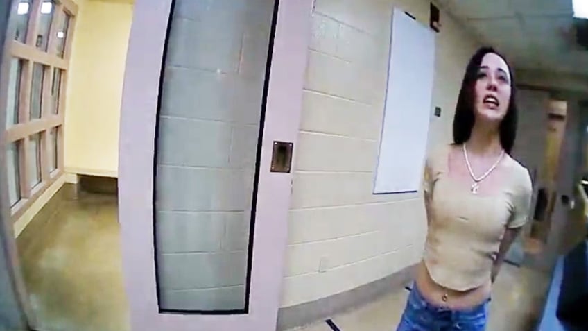 drunk stripper gets frisky with cop in awkward traffic stop video