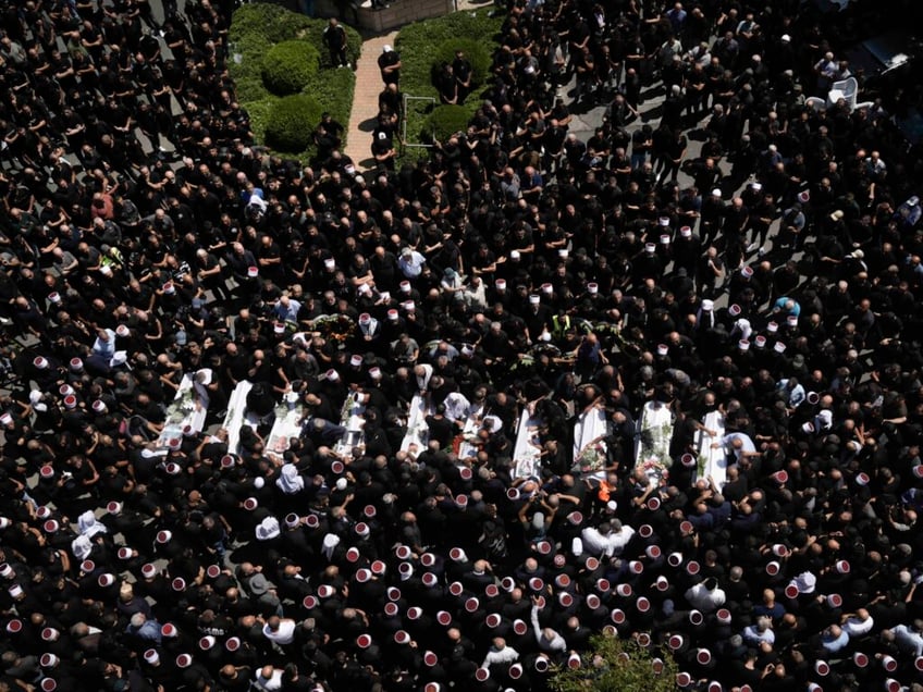 druze israeli arab town buries 11 of 12 children killed by hezbollah rocket