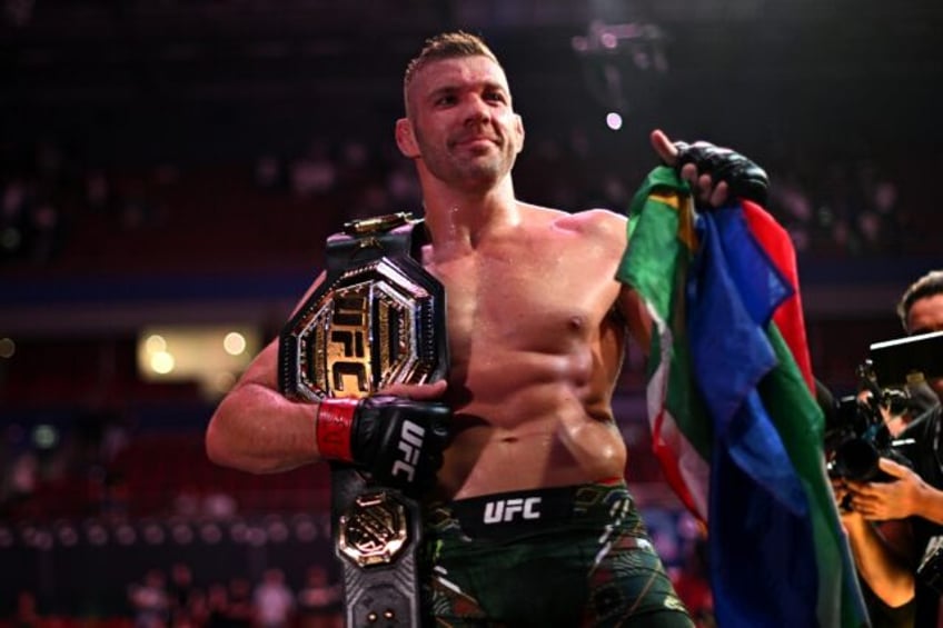 South Africa's Dricus du Plessis celebrates his victory over Sean Strickland in the UFC mi