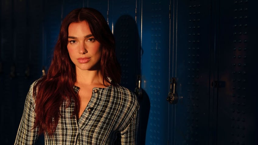 Dua Lipa poses for a portrait