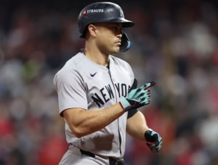 Dual elbow pain puts opening day in doubt for Yankees' Giancarlo Stanton