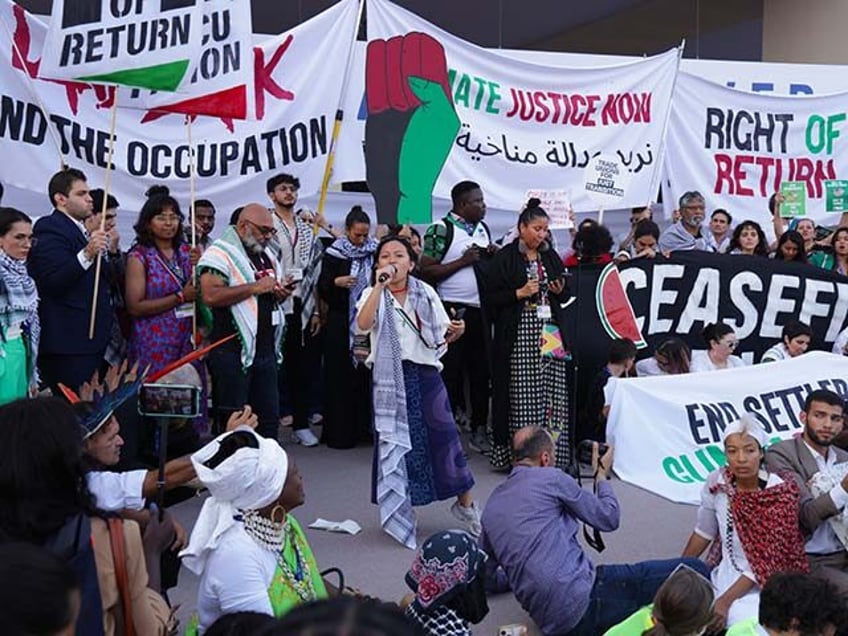 Activists gather after marching in protest on day nine of the UNFCCC COP28 Climate Conference at Expo City Dubai on December 09, 2023 in Dubai, United Arab Emirates. The march coincided with a Global Day of Action for Climate Justice and protesters demanded a ceasefire in Gaza, global climate justice …