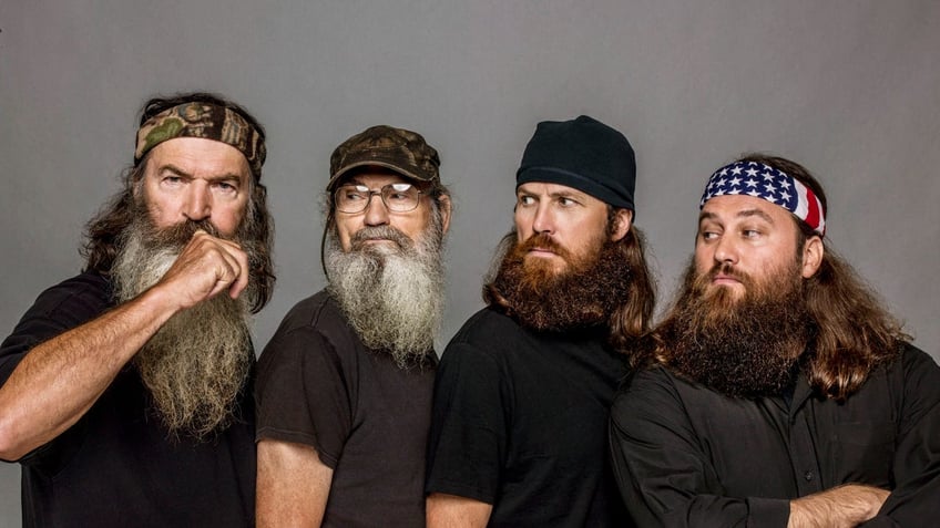 This undated image released by A&E, shows The Robertsons, from left, Phil, Si, Jase and Willie, from the reality series, "Duck Dynasty." The Las Vegas show "Duck Commander Musical," based on the popular series, premiered Wednesday, April 15, at the Rio All-Suites Hotel & Casino and tells the story of a family duck-call business that led to reality show juggernaut "Duck Dynasty." (Zach Dilgard/A&E via AP)