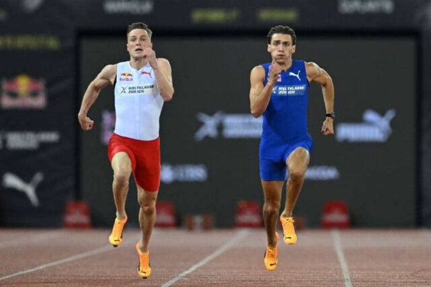 Norwegian hurdler Karsten Warholm (L) and Swedish pole vaulter Armand Duplantis (R) compet