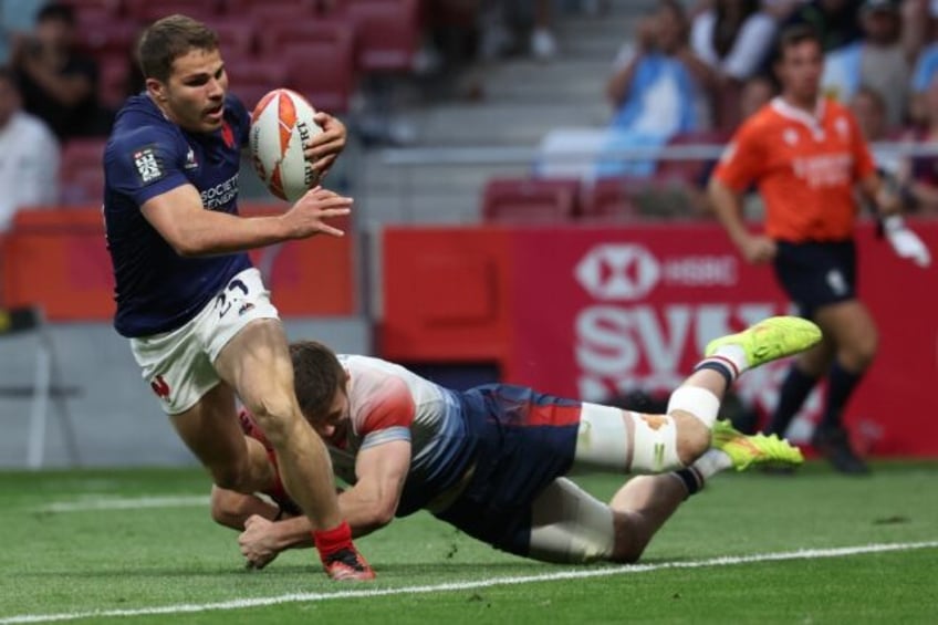 France's Antoine Dupont in action at the World Rugby Sevens Series frand final in Madrid