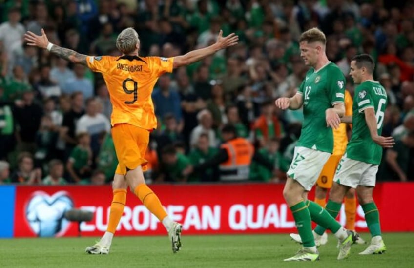 dutch edge out ireland poland beaten in albania