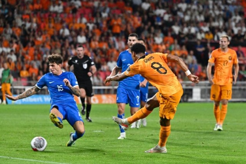 dutch move into euro slot with 3 0 victory over greece