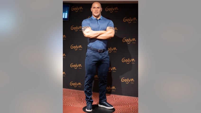 dwayne johnson says paris wax figure needs important improvements after public outcry