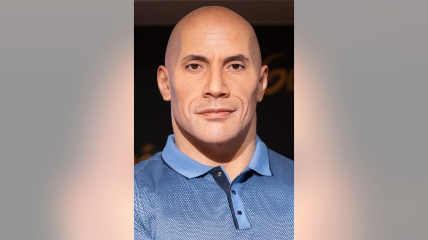 dwayne johnson says paris wax figure needs important improvements after public outcry