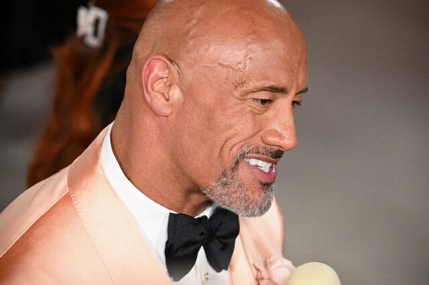 dwayne the rock johnson asks museum to fix his waxworks skin color