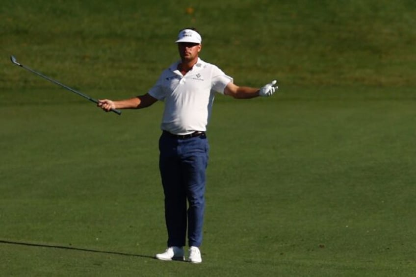 Keith Mitchell celebrates his eagle on the 18th at the PGA Valspar Championship in Florida