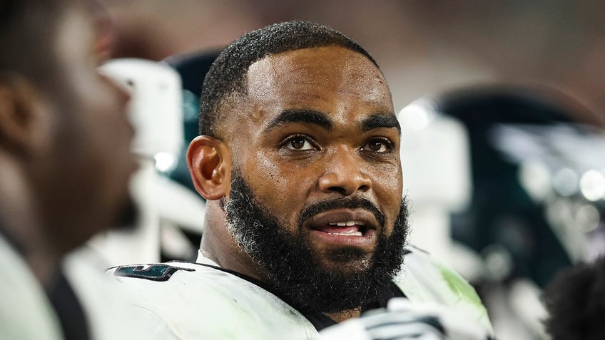 Brandon Graham looks on from the sidelines