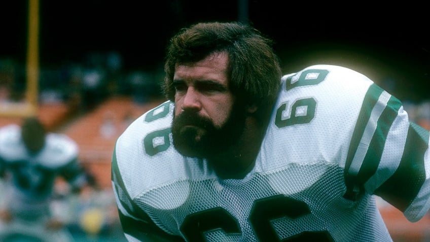 Bill Bergey warms up before a game