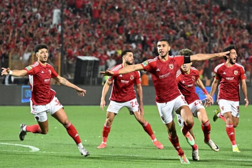 Captain Ramy Rabia (C) leads Al Ahly celebrations after a fourth-minute goal against Esper