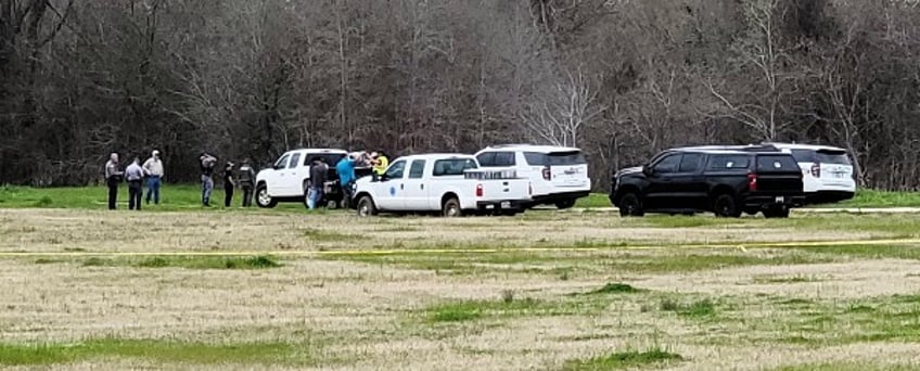 A multi-agency law enforcement team gathered along the Trinity River in San Jacinto County to search for Audrii Cunningham. (Bob Price/Breitbart Texas)