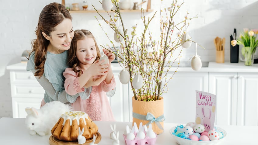 child with Easter eggs