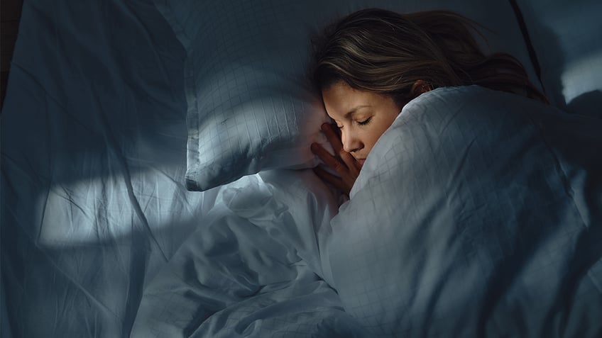 Close-up image of woman sleepign