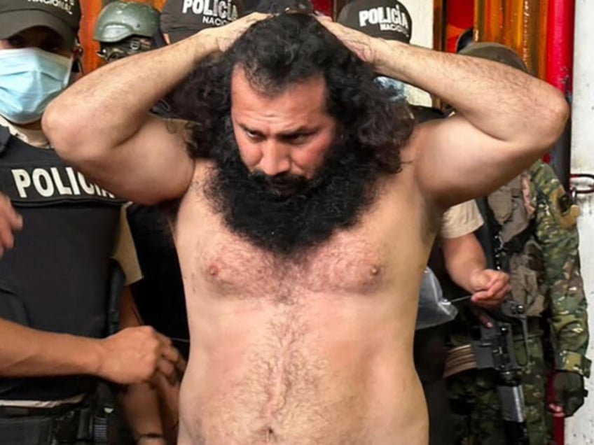 Adolfo Macías, aka Fito, leader of the Los Choneros criminal gang, is transferred to “The Rock” maximum security prison in Guayaquil, Ecuador in this army handout released on August 12, 2023 (Ecuadorean armed forces via AFP).