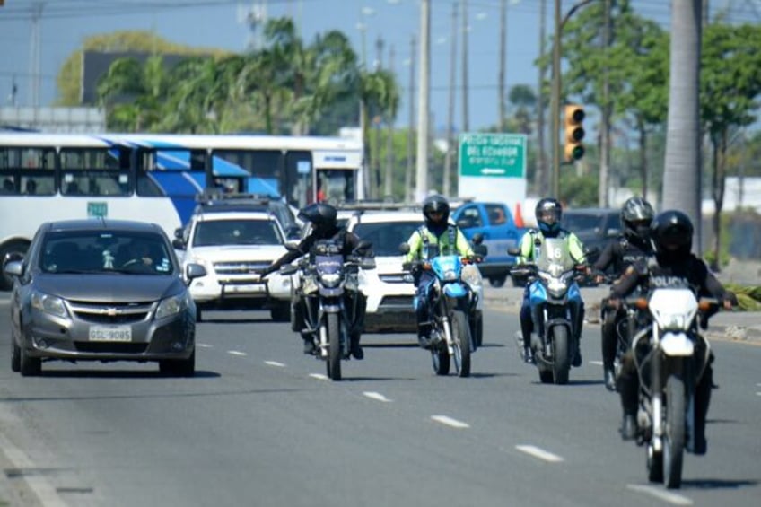 The caravan of vehicles and police motorcycles transporting Ecuador's ex-vice president Jo