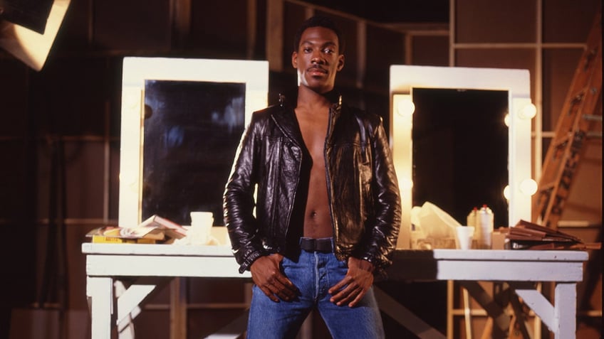 Eddie Murphy standing backstage