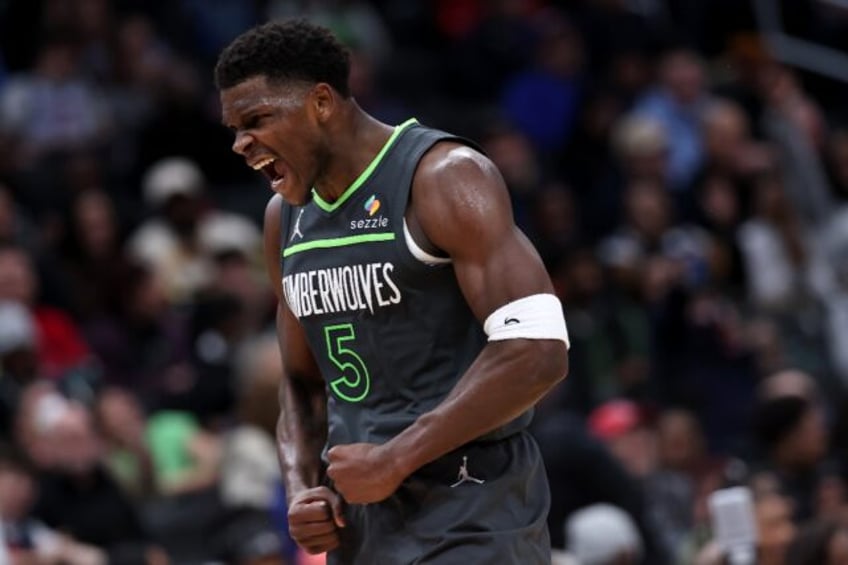 Minnesota's Anthony Edwards celebrates during the Timberwolves' NBA victory over the Washi