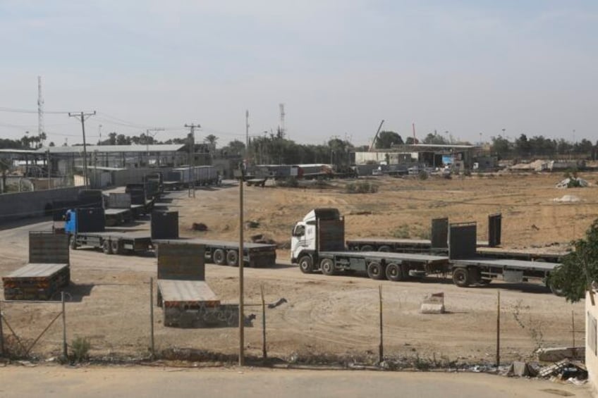 egypt border crossing opens letting a trickle of desperately needed aid into besieged gaza