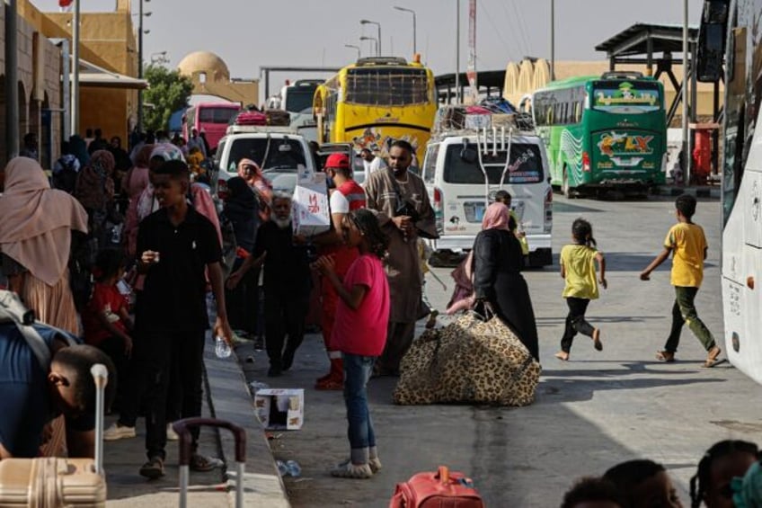 People fleeing war-torn Sudan arrive at Qastal land port crossing to Egypt in May last yea