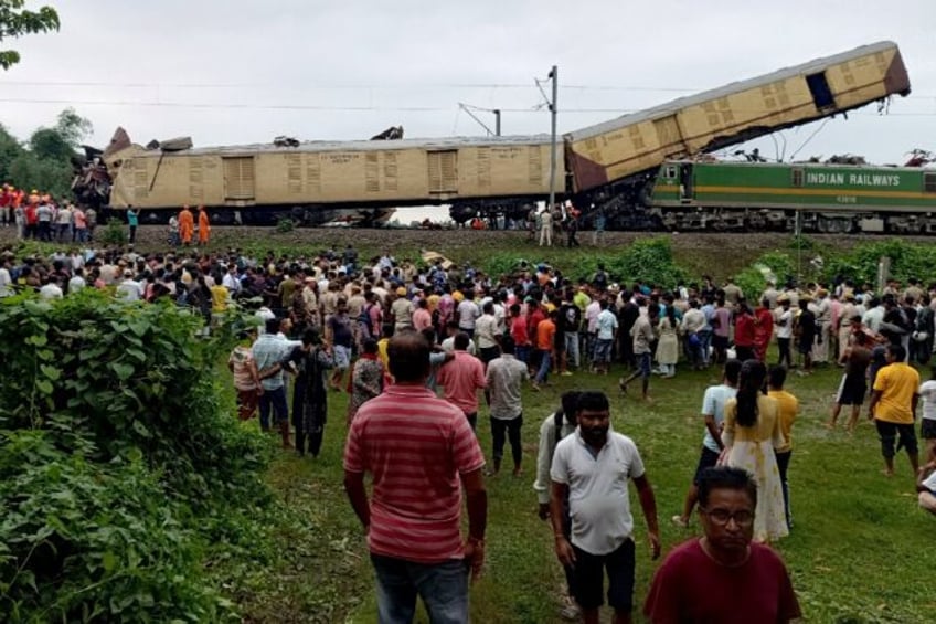 Three passenger carriages were derailed and flipped on their side, while another carriage