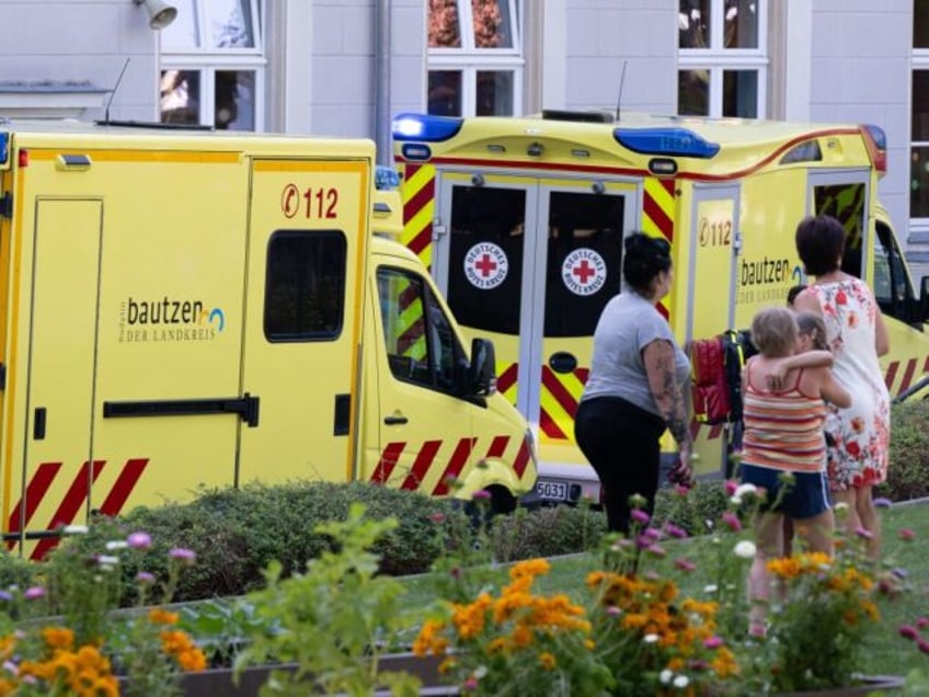 eight year old boy stabbed by teenager who then set himself on fire at school in germany