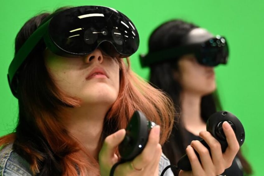 Students at the Hong Kong University of Science and Technology use virtual reality headset